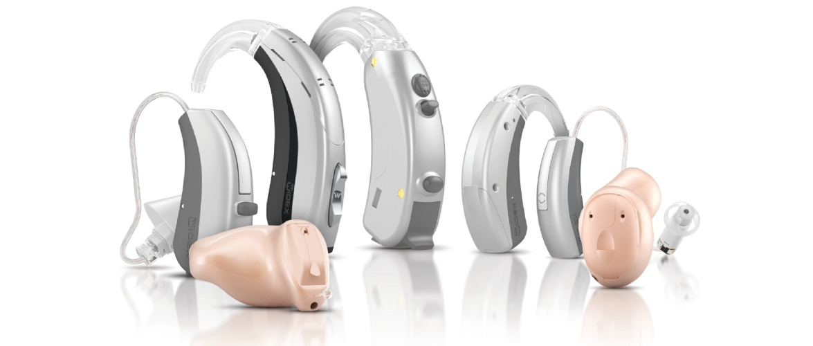 Different Types of Hearing Aids On Display In The White Background.