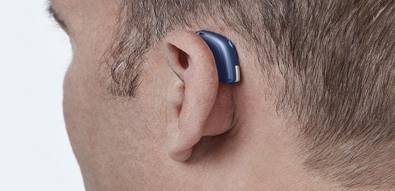 Modern digital in the ear hearing aid for deafness and the hard of hearing in man's ear.