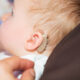 A Little Kid Wearing Hearing Aid.