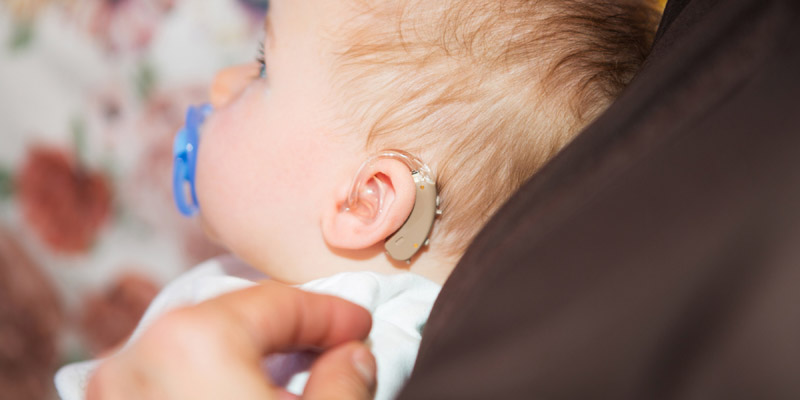 A Little Kid Wearing Hearing Aid.