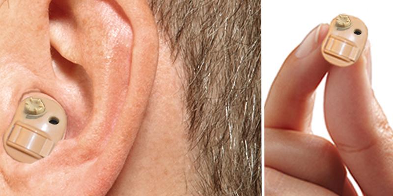 A Man Showing Hearing Amplifier.